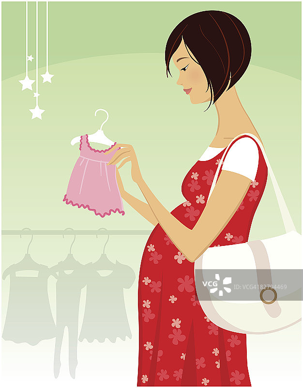 孕妇在零售店看婴儿服装图片素材