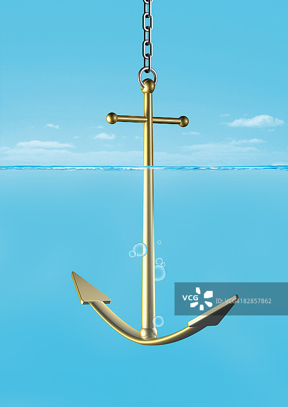 悬挂在链条上的巨大金色船锚图片素材