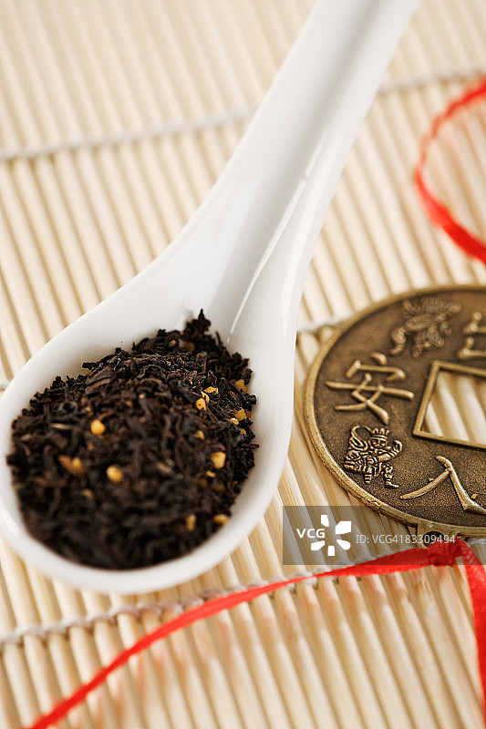 好运符和茶叶勺子图片素材