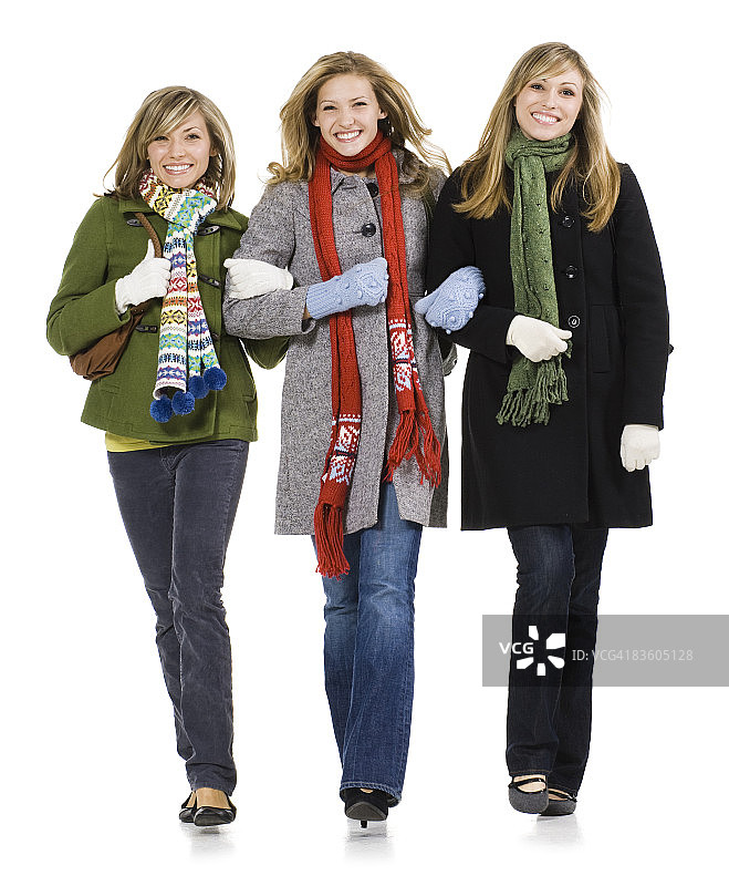 三个女人手挽手图片素材