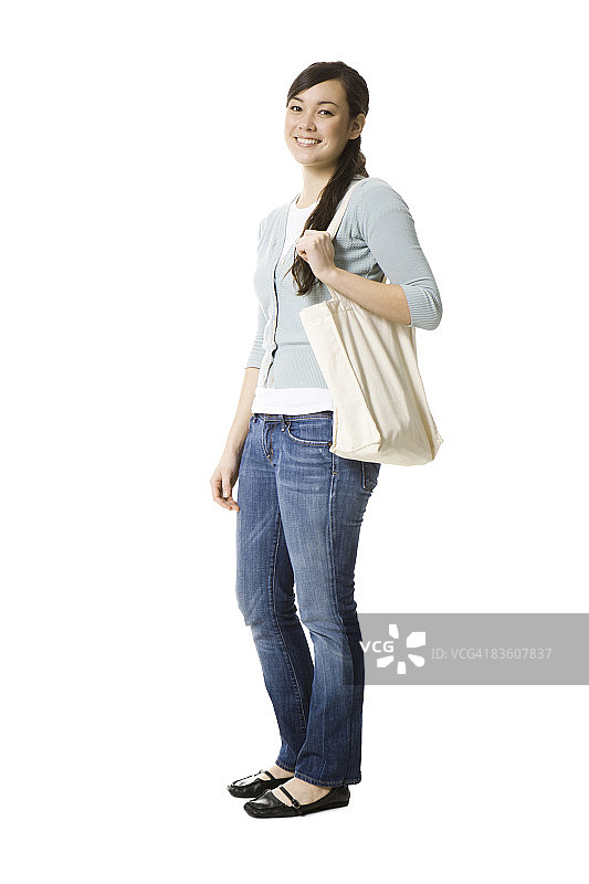年轻女人穿着开衫图片素材