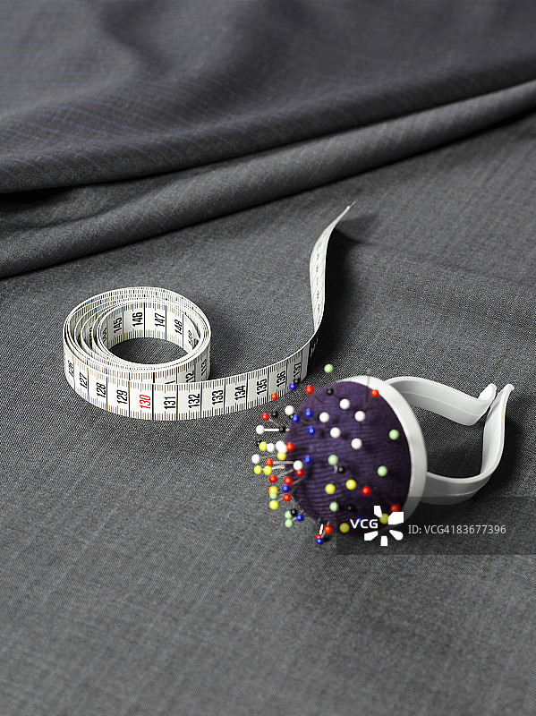 卷尺、针垫和布料图片素材