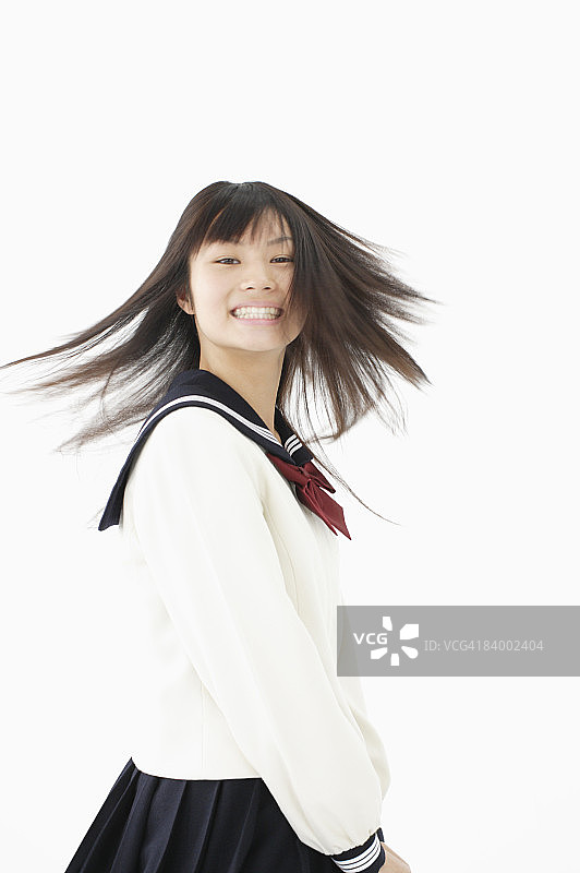 转身的女学生，影棚拍摄图片素材