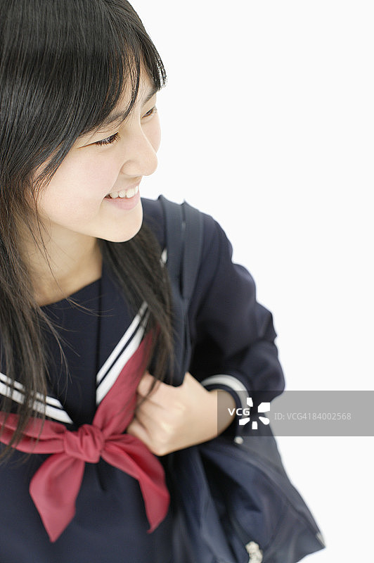 女学生拿着包，学生图片素材