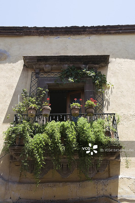 墨西哥瓜纳华托州圣米格尔-德阿连德的窗户图片素材