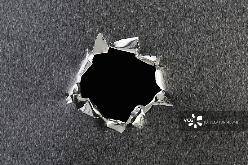 金属上的孔洞图片素材