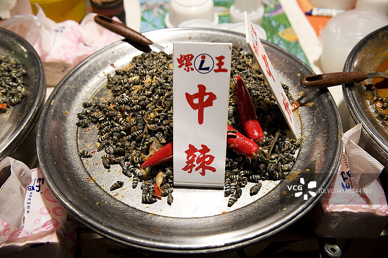 中国台湾垦丁的一碗煮熟的蜗牛图片素材