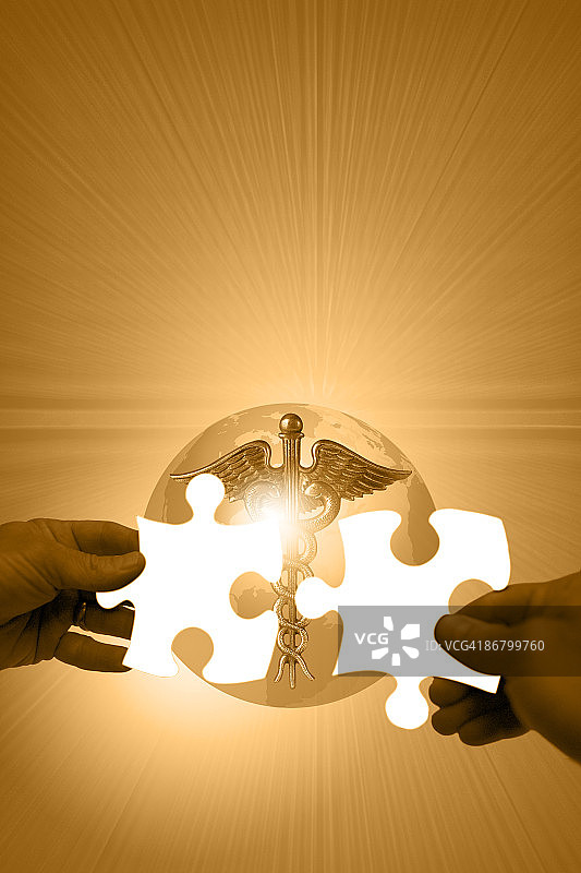 手持拼图，背景是商神杖图片素材