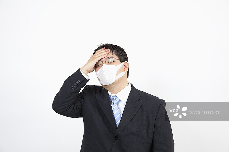 戴口罩的商人图片素材