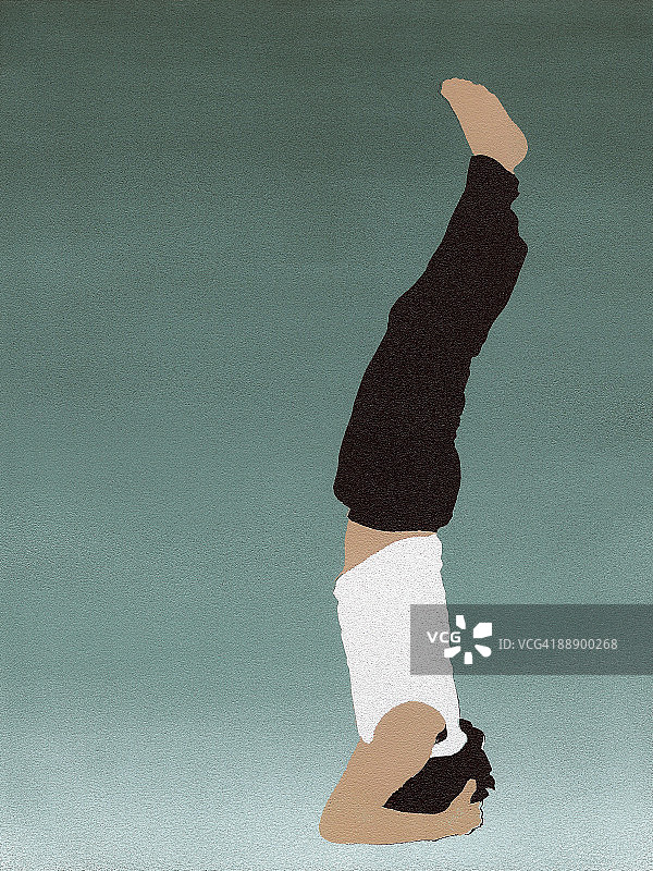 男人做头倒立图片素材