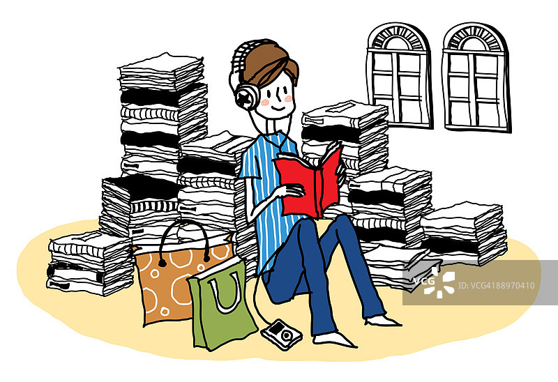 青少年男孩读书听音乐的侧视图图片素材