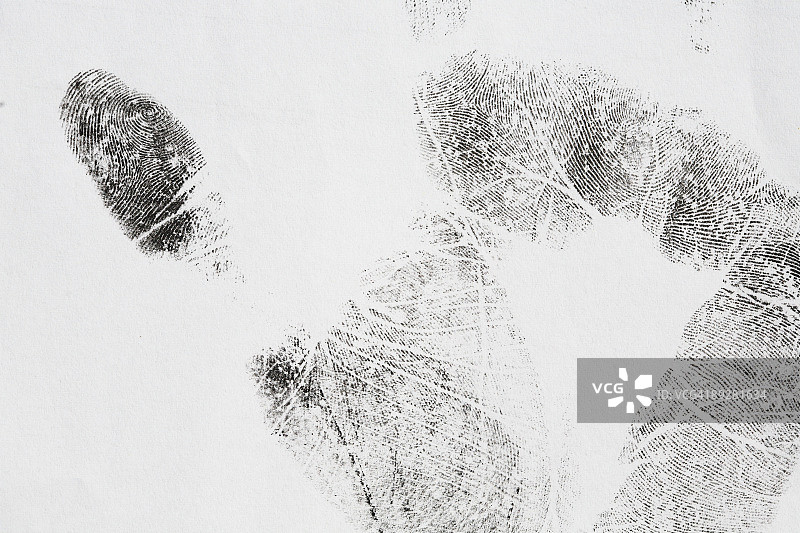 用墨水在纸上制作的手印图片素材