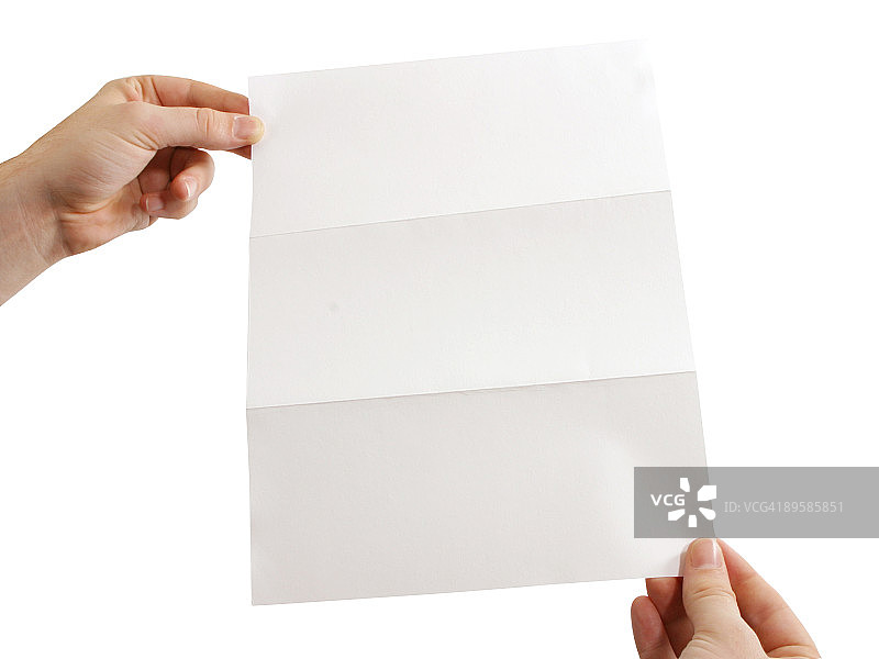 手拿折叠的纸图片素材