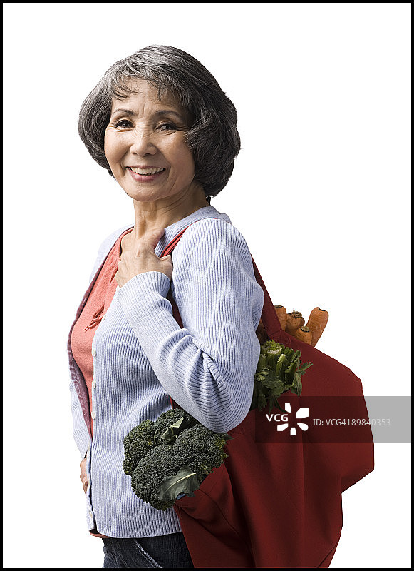 拿着可重复使用购物袋的女人图片素材
