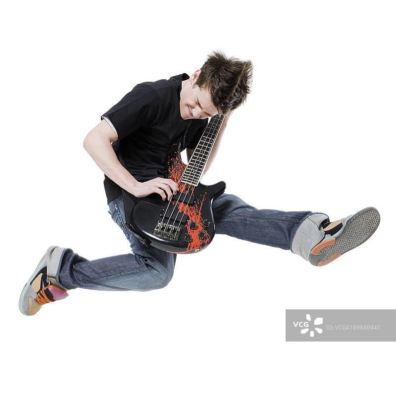 拿着电吉他的青少年图片素材