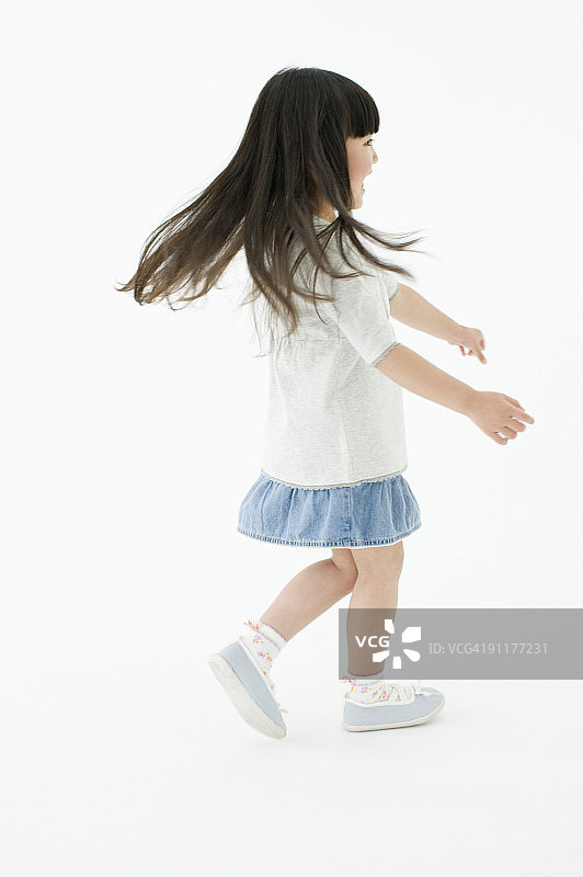 玩耍的女孩，影棚拍摄图片素材