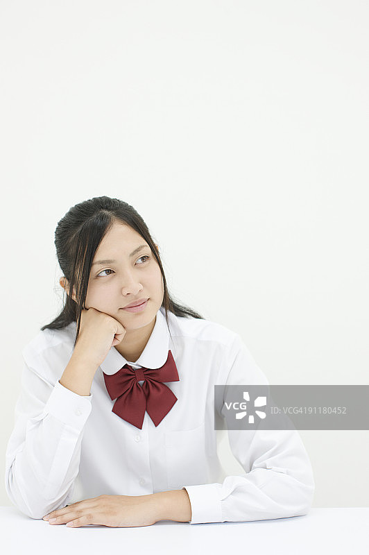 穿校服的女孩，肖像照，影棚拍摄图片素材