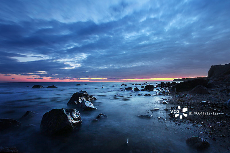 布洛克岛库尼姆斯湾日落长曝光图片素材