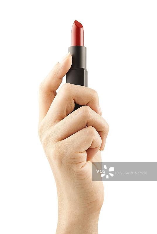 女人拿着一支红色口红图片素材