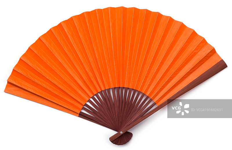 孤立的橙色亚洲风扇与棕色染色木图片素材