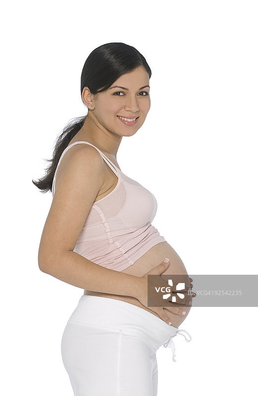 孕妇托着肚子图片素材