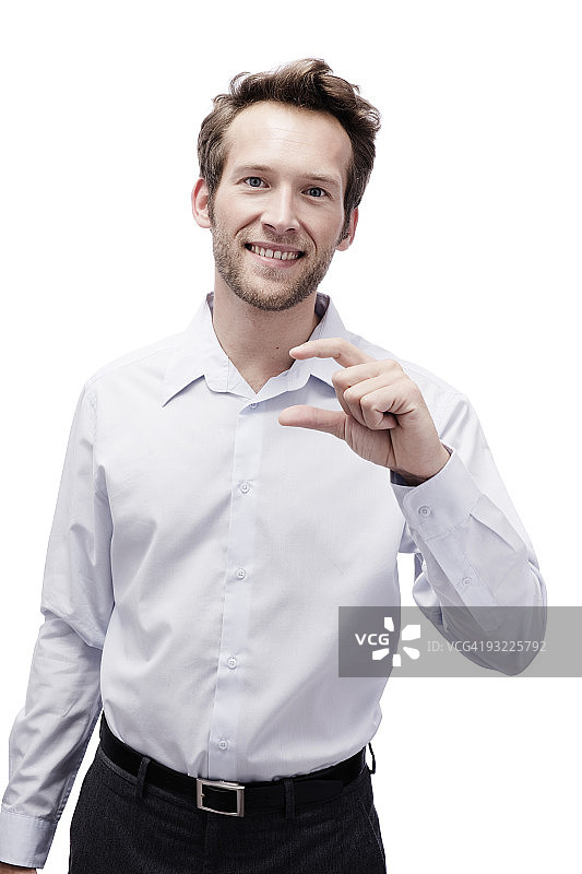 年轻男人做手势微笑肖像图片素材