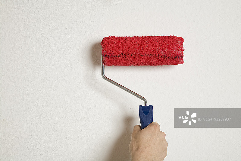 德国，正在刷成红色的白墙图片素材