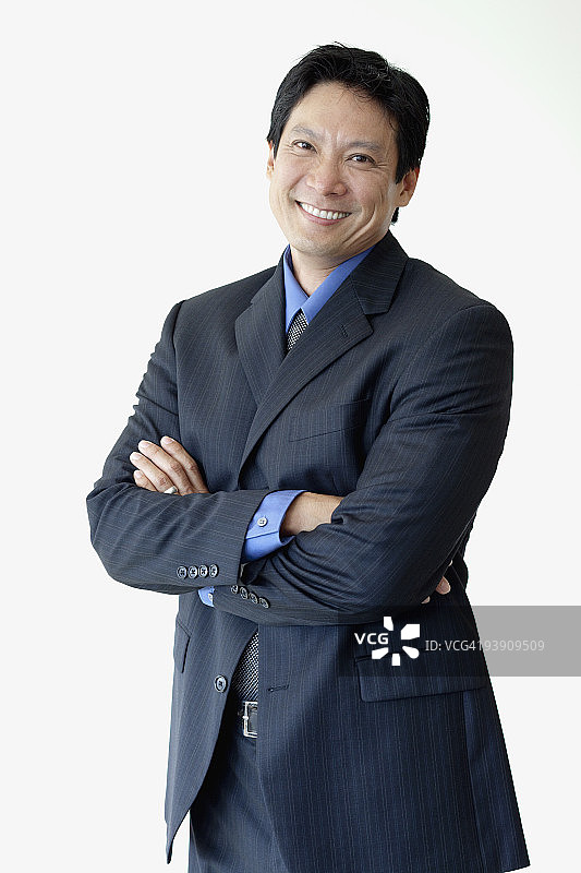 交叉双臂的日本商人图片素材