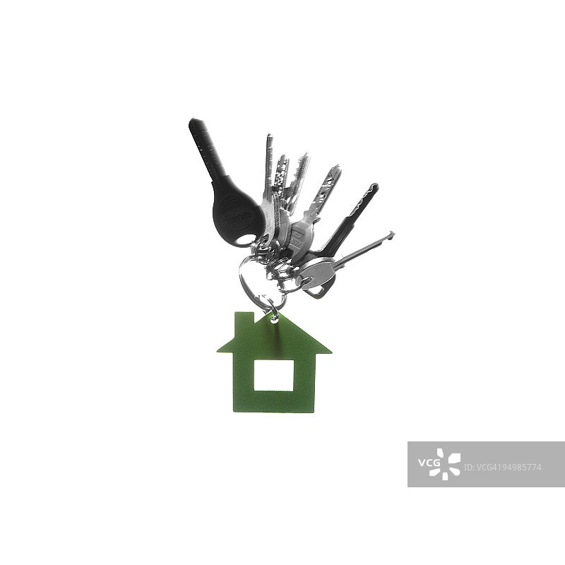 带有绿色房屋形状钥匙扣的钥匙图片素材