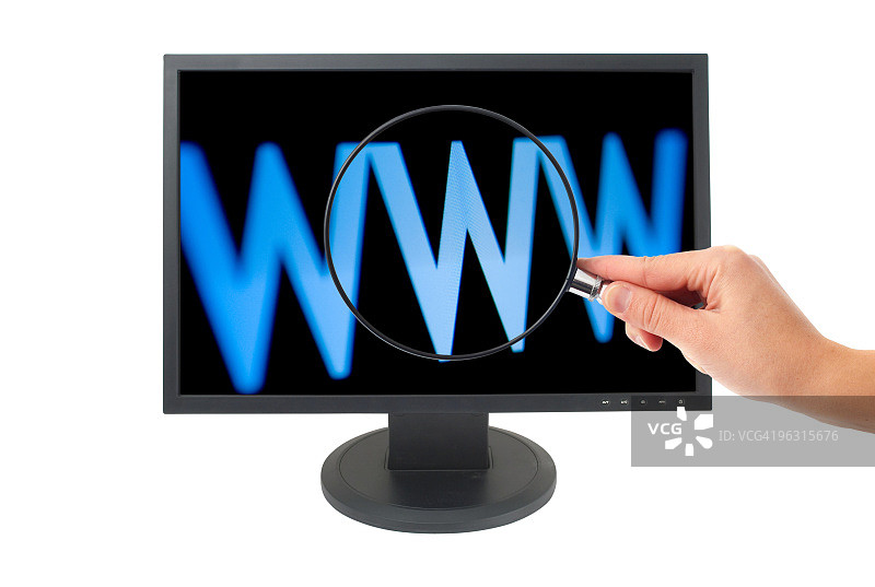 液晶显示器和放大镜图片素材