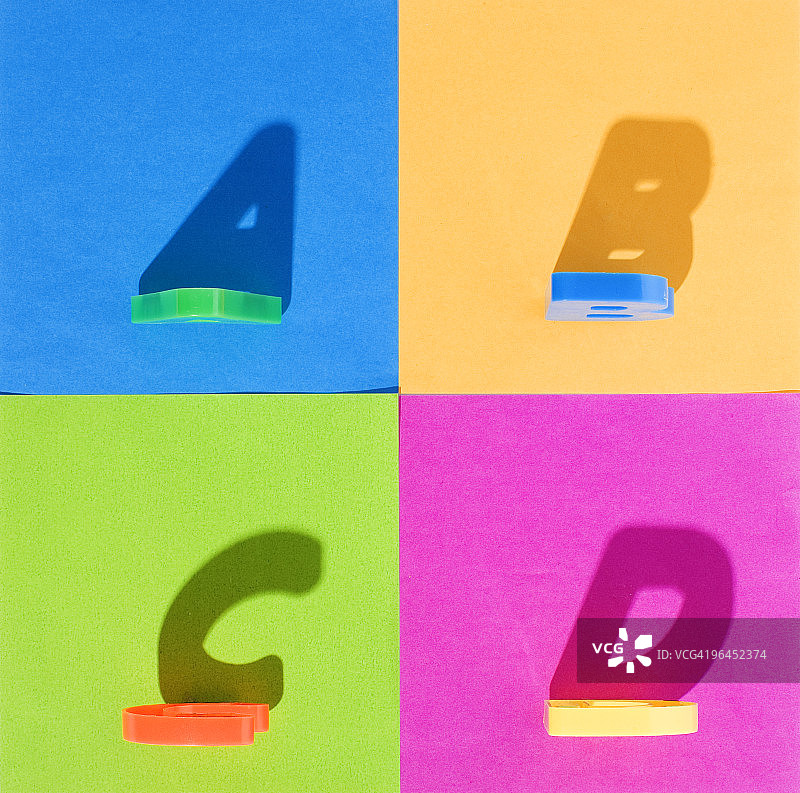 投射在纸上的字母阴影图片素材