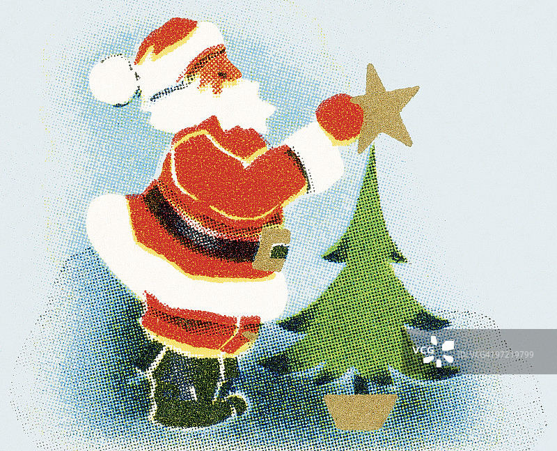 圣诞老人把星星放在树上图片素材