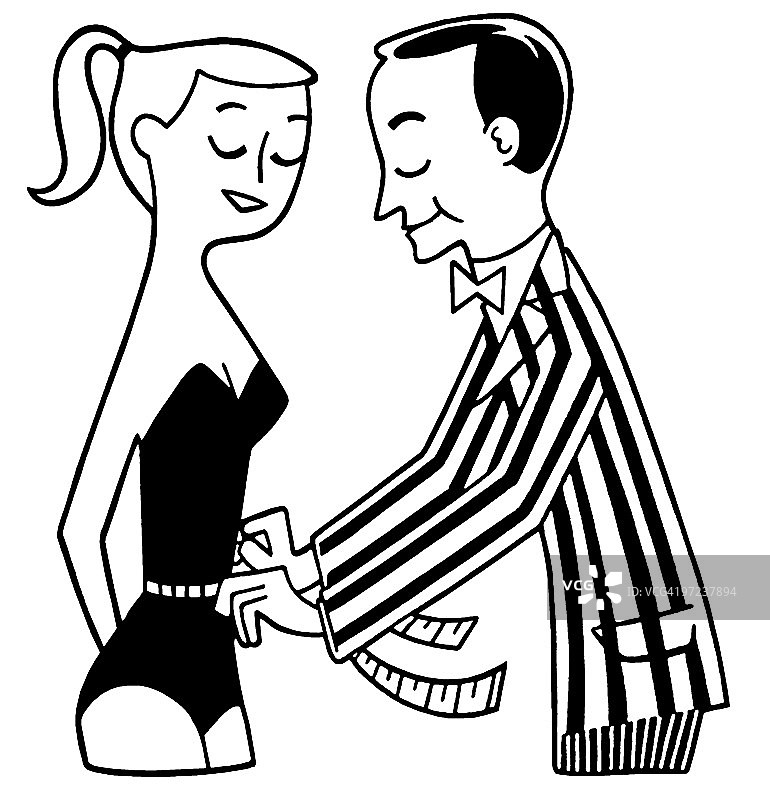 男人测量女人的腰围图片素材