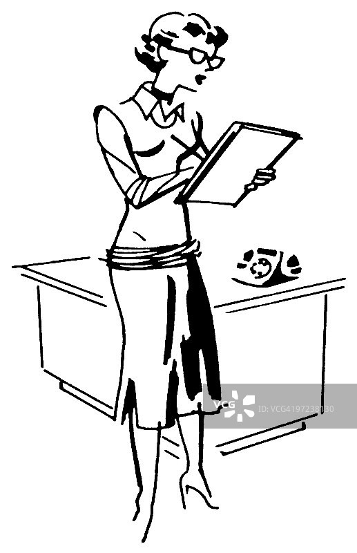站在桌子前的女人图片素材