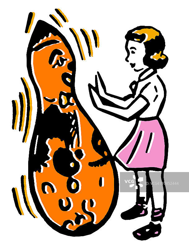 与大型小丑玩耍的年轻女孩图片素材