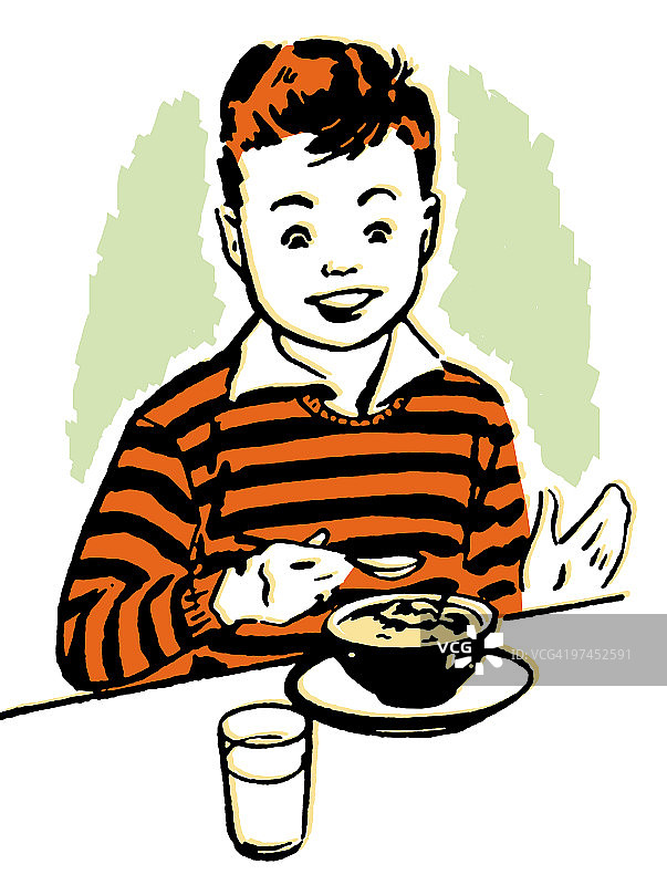 一个享受晚餐的年轻男孩图片素材