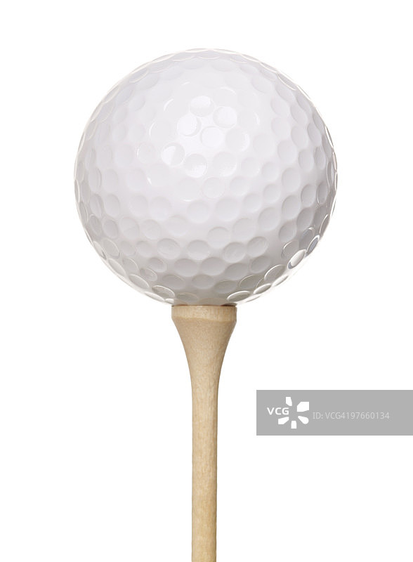 木制球托上的白色高尔夫球图片素材