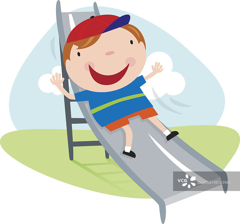 在游乐场滑梯上的男孩图片素材