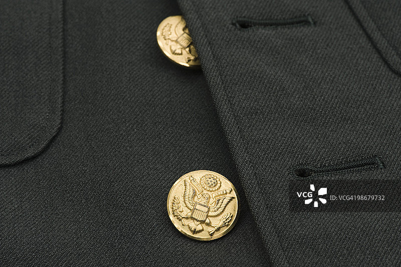 军装夹克的黄铜纽扣图片素材