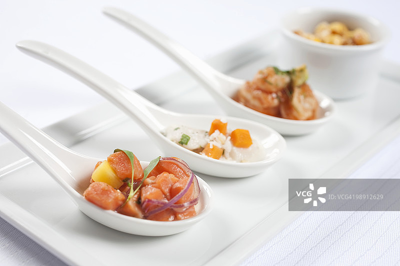 什锦海鲜开胃小吃勺，特写图片素材