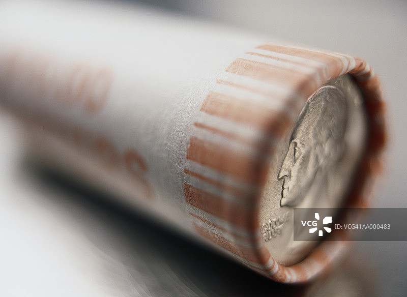 一卷25美分硬币的特写图片素材