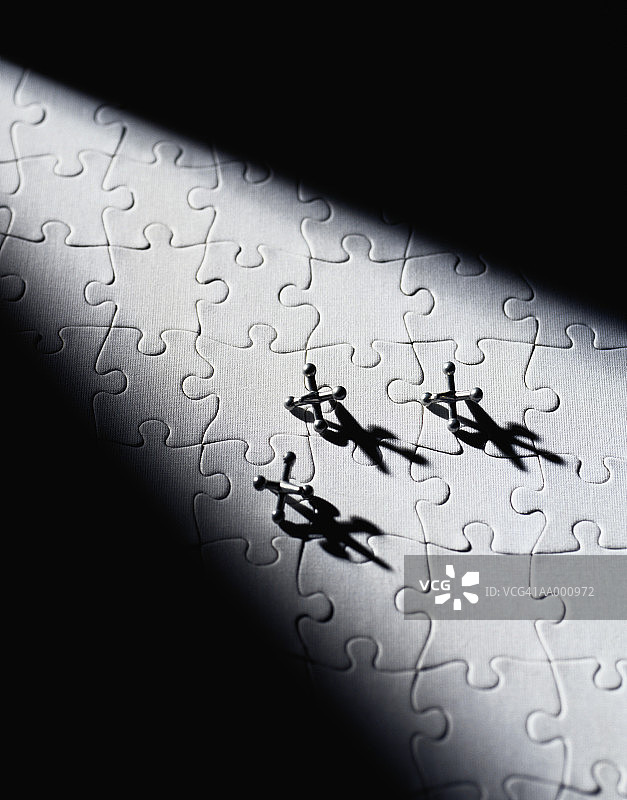 拼图上的千斤顶图片素材