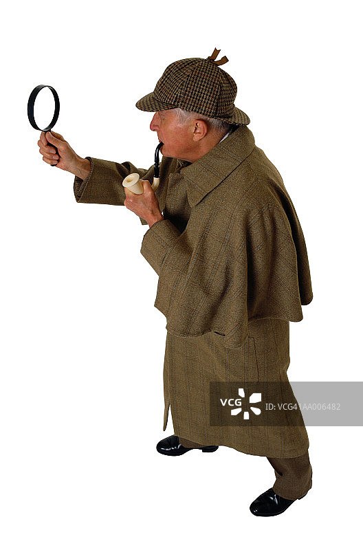 手持烟斗和放大镜的夏洛克·福尔摩斯图片素材