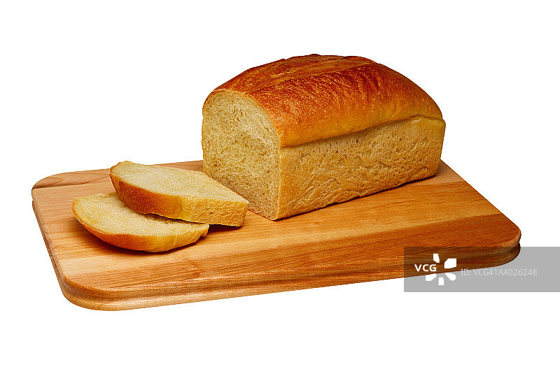 木制砧板上的面包切片图片素材