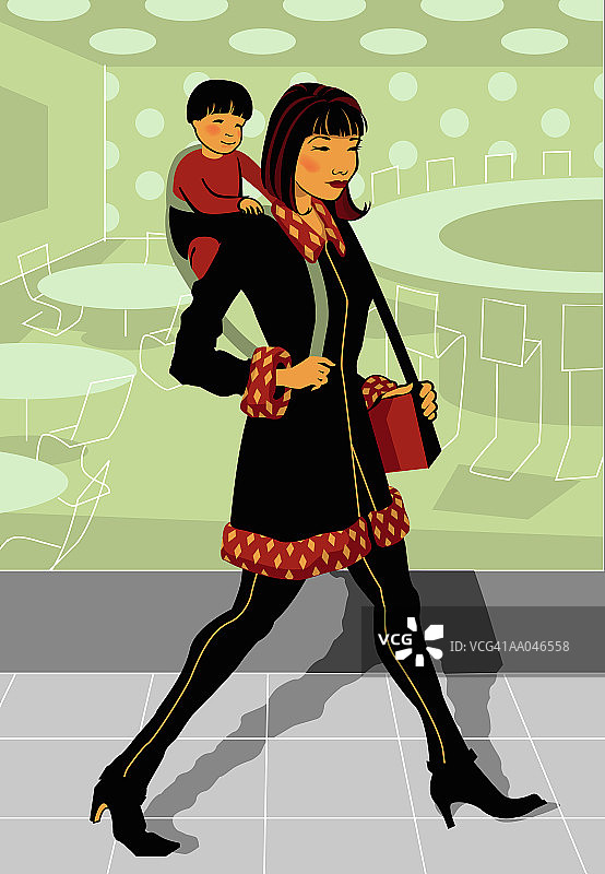 母亲用婴儿背带抱着男婴（12-15个月大）图片素材