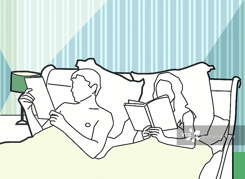 情侣在床上阅读图片素材