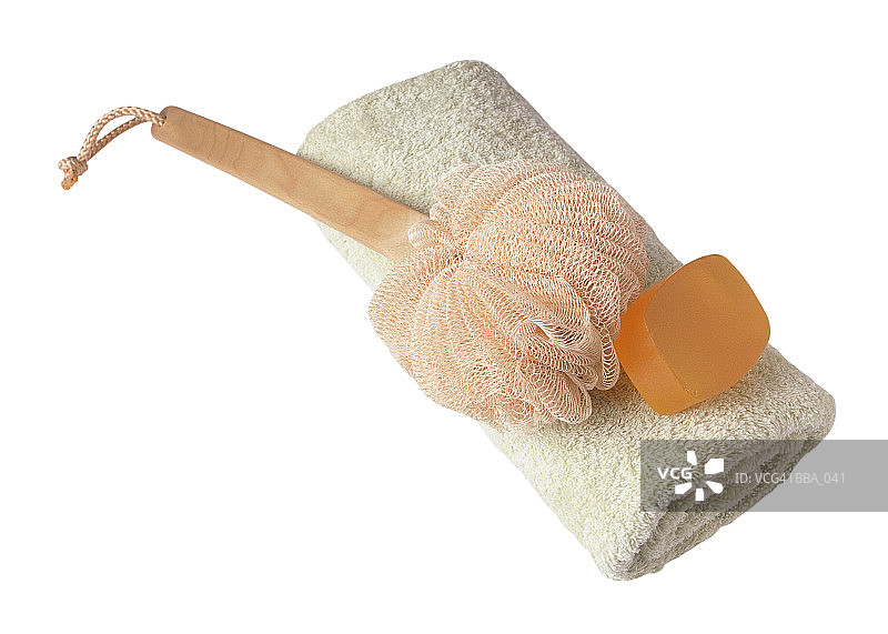 毛巾上的肥皂和搓背刷图片素材