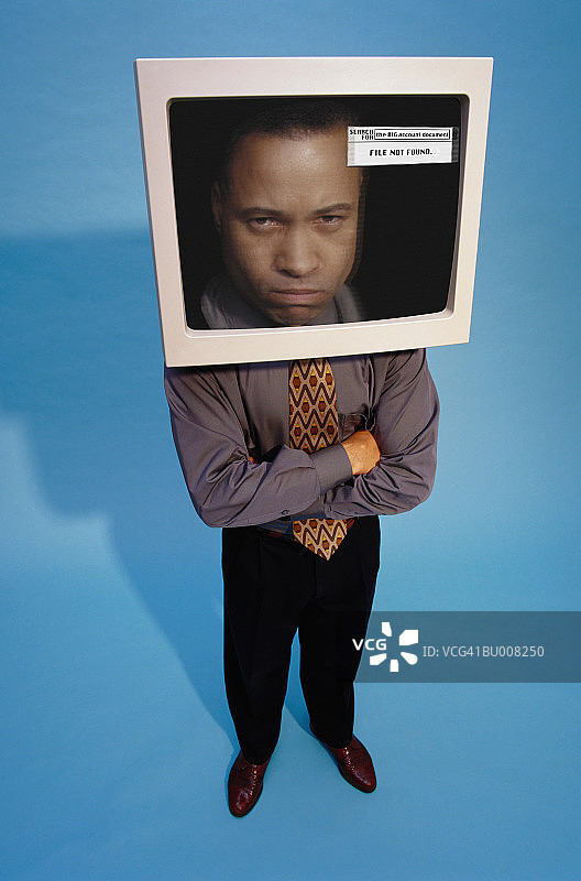 头在电脑显示器中的商人图片素材