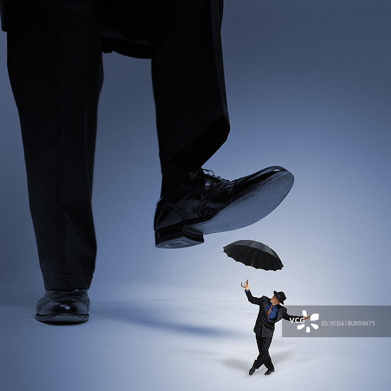 被踩踏的商人图片素材