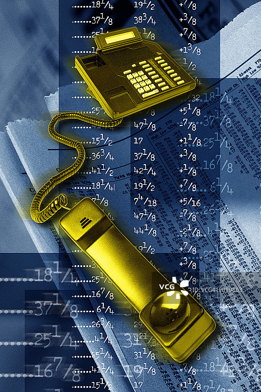 背后有股票报价的黄色电话图片素材